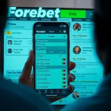 User logging into the Online Forebet Nigeria platform on a laptop